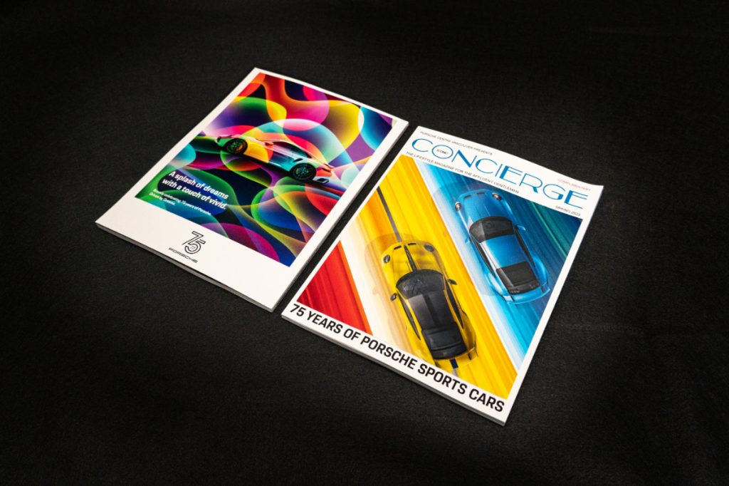 Front and back covers of brightly coloured magazine called Iconic Concierge. On a black background and demonstrates colourful printing capabilities.